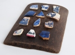Karen Trotter Artist "Pieces" (2015) Crockery on Driftwood 220x150mm £30.00